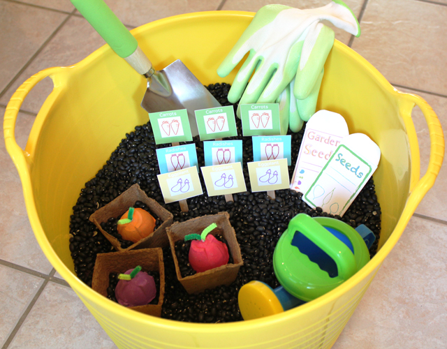 DIY vegetable garden sensory box with FREE PRINTABLES - a great way to get kids playing and learning about planting.