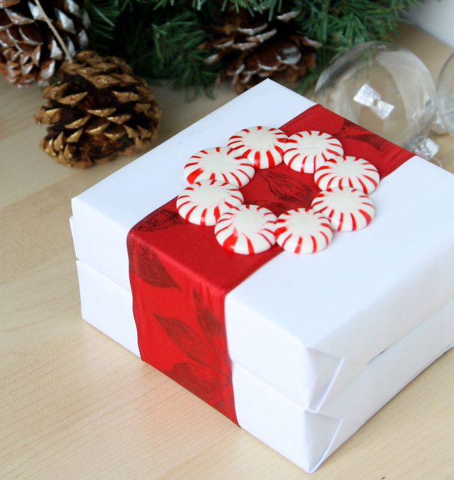 Red and white Christmas gift wrap with peppermint candy