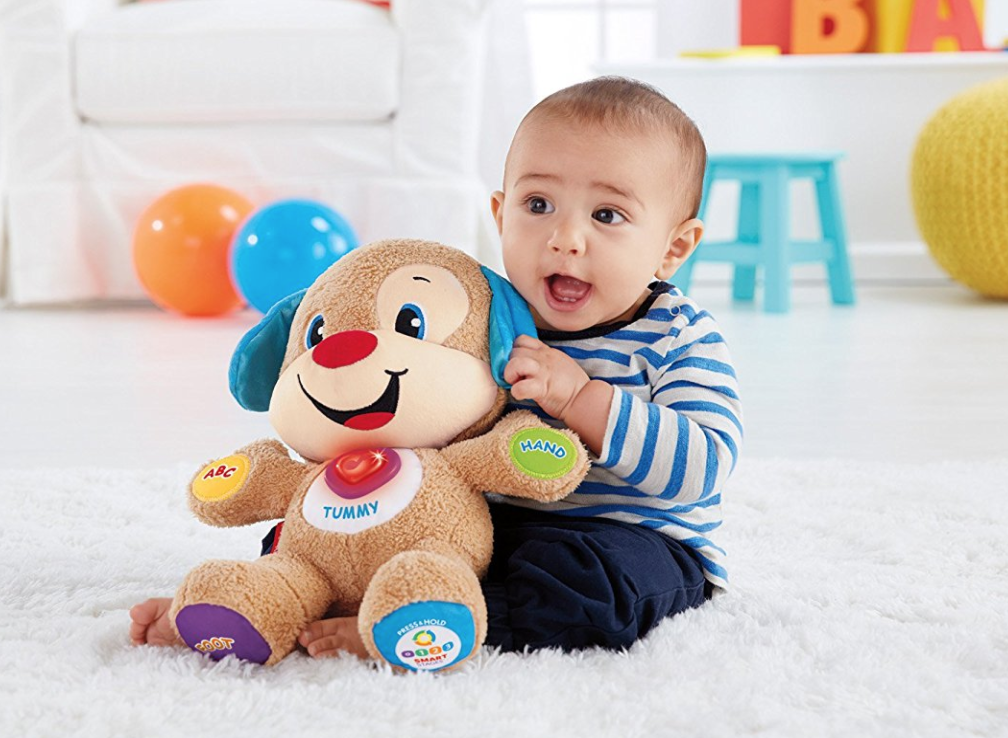 7 year old boy playing with stuffed animals