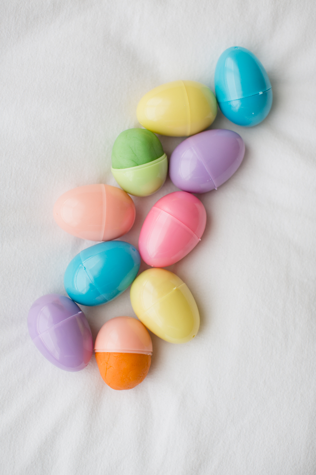 Playdough filled Easter eggs - perfect Easter basket filler! Post also has free printable play dough Easter mats.