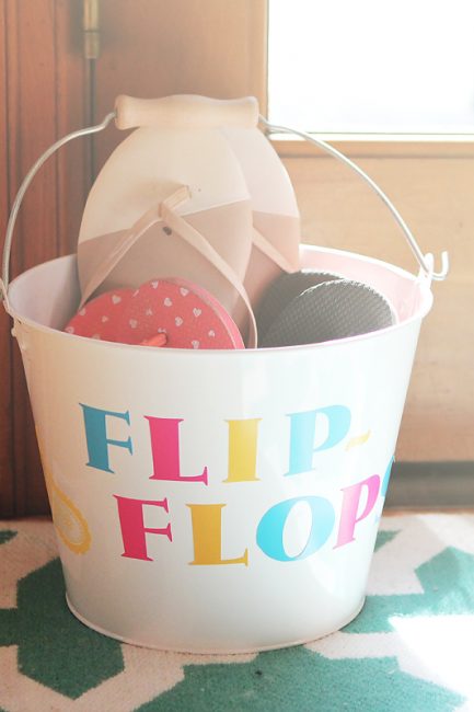DIY Family Flip Flops Bucket - Need to make this and keep by the back door so my 3 year old will stop getting slivers from the deck!