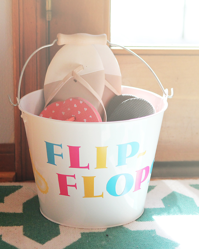 DIY Family Flip Flops Bucket - Need to make this and keep by the back door so my 3 year old will stop getting slivers from the deck!
