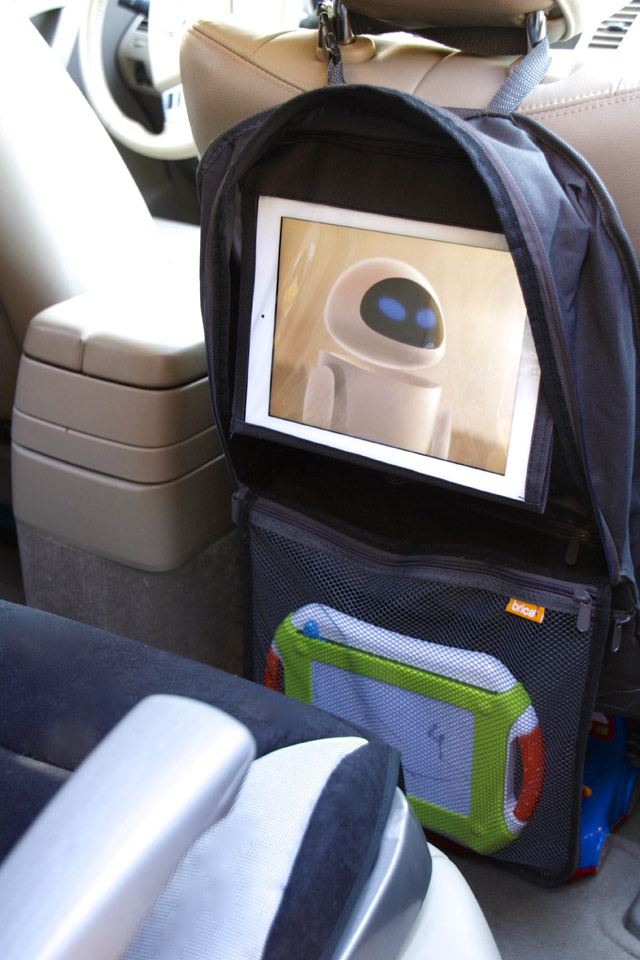The best tips and products for driving around with happy kids - love that iPad holder!